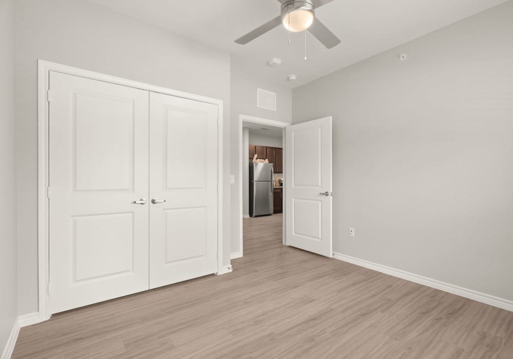 Spacious bedroom with closet storage at Walnut Springs in Seguin, Texas