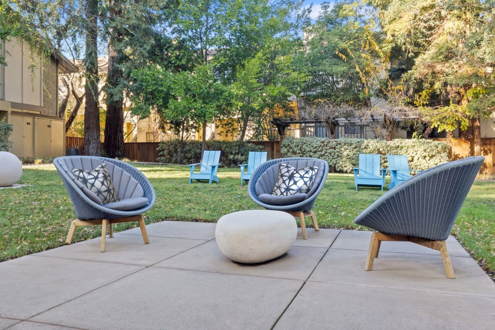 Relaxing outdoor lounge, waiting area at Montecito Apartments in Santa Clara, California