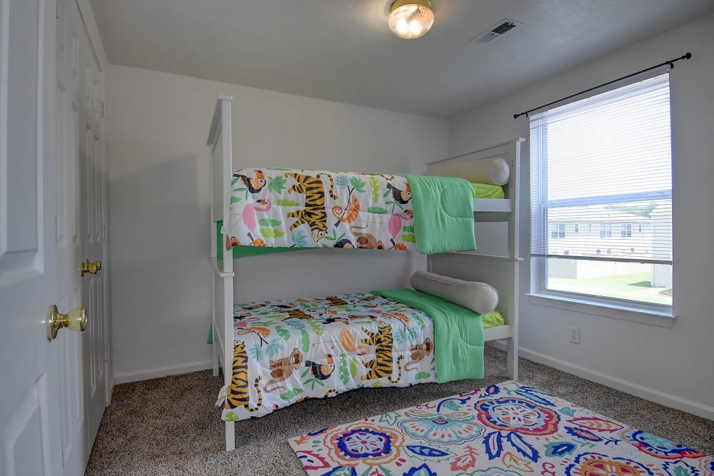 Bedroom for children with bunk bed and windows at Mariner's Watch in Norfolk, Virginia