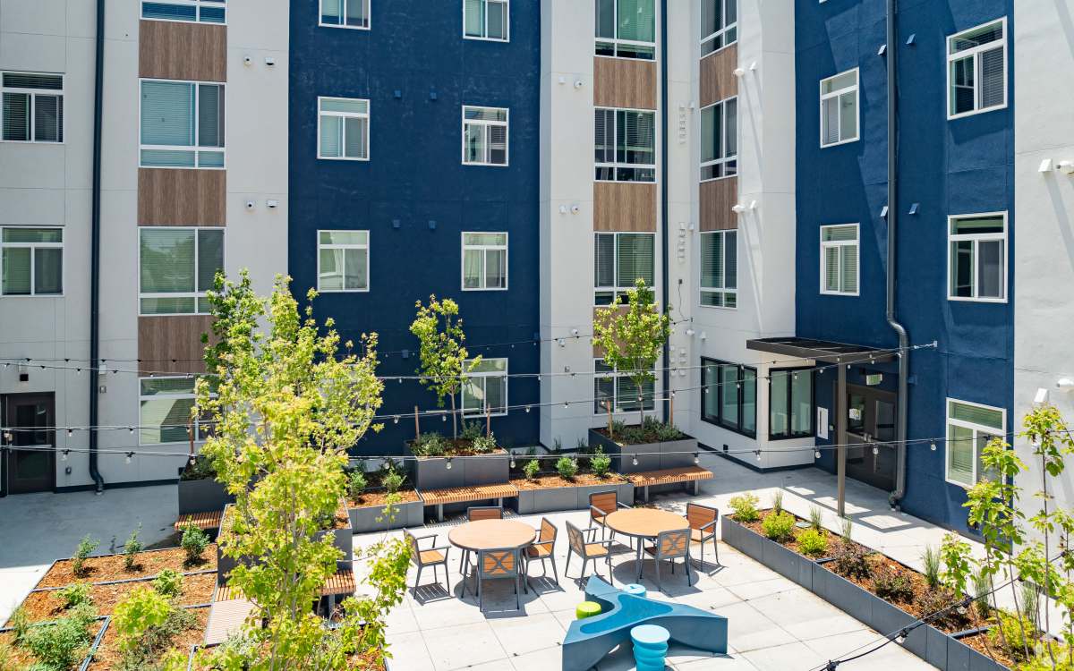 Outdoor community seating area at The Rose on Colfax in Denver, Colorado