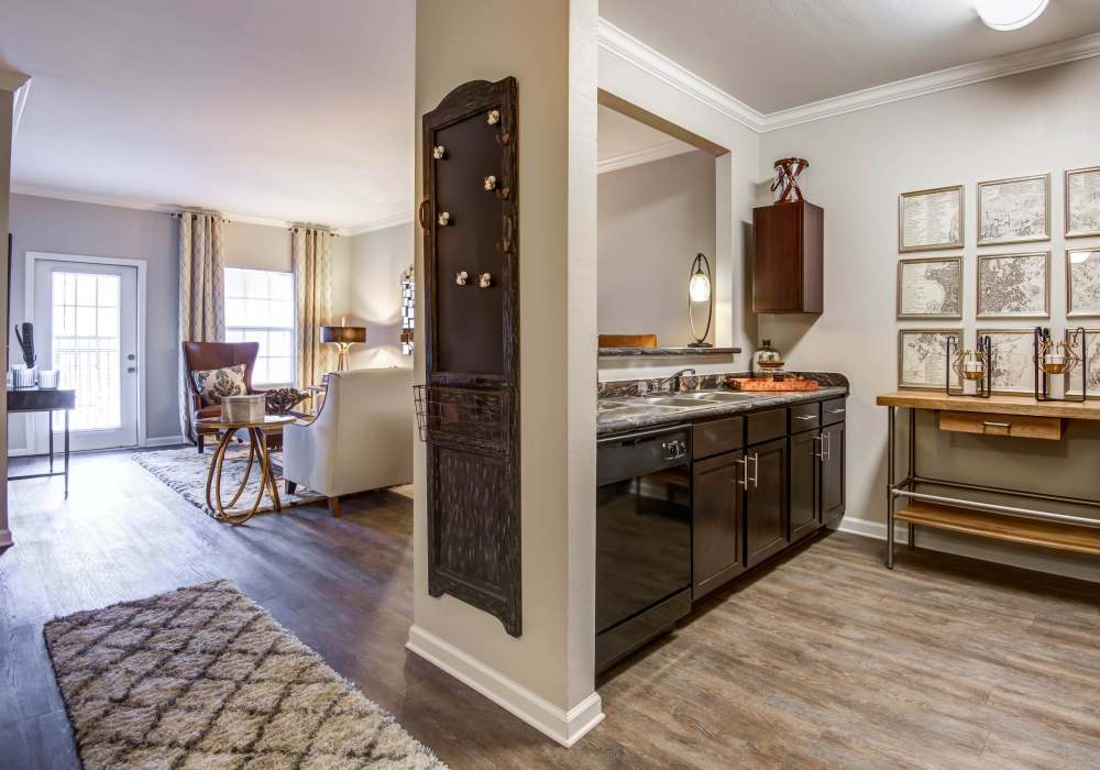 Black refrigerator, microwave, stove at Maystone at Wakefield in Raleigh, North Carolina