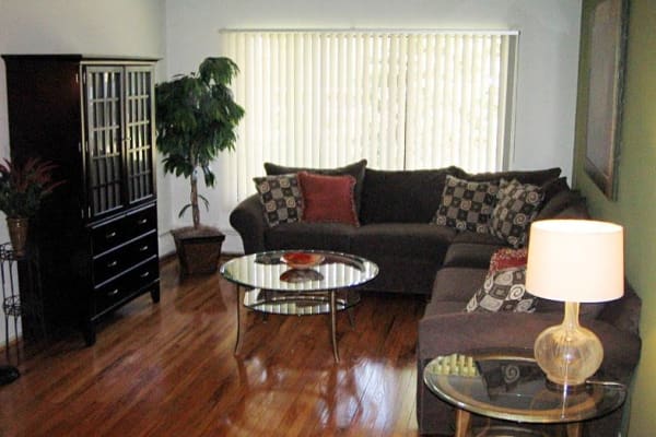 Spacious living room at Ann Arbor Woods Apartments in Ann Arbor, Michigan