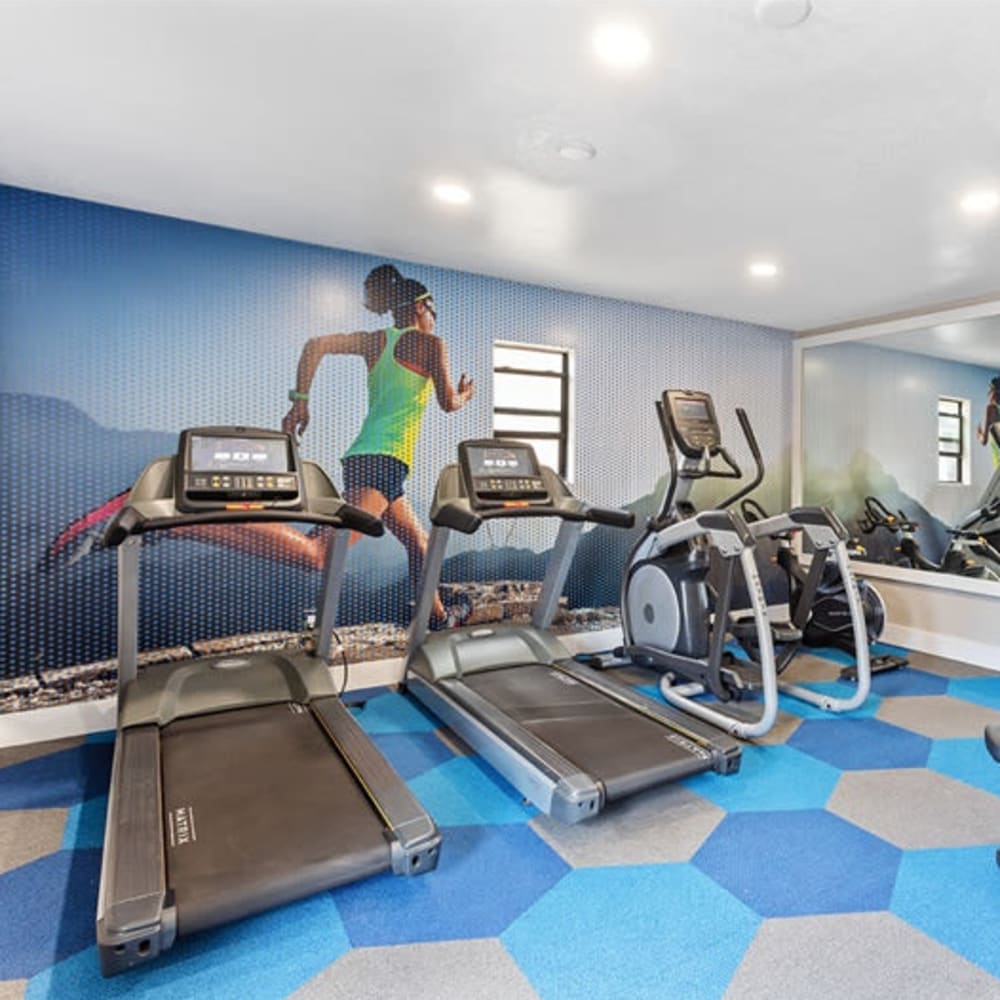 A fitness center with aerobic machines at 1408 Casitas at Palm Valley in Avondale, Arizona