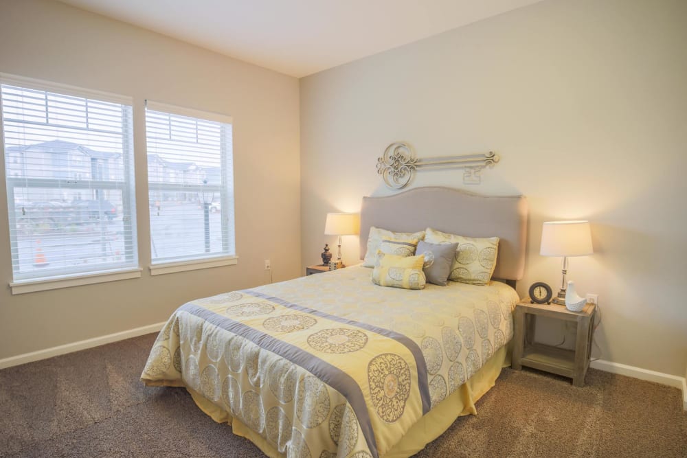 a sunny bedroom at Keizer Station Apartments in Keizer, Oregon