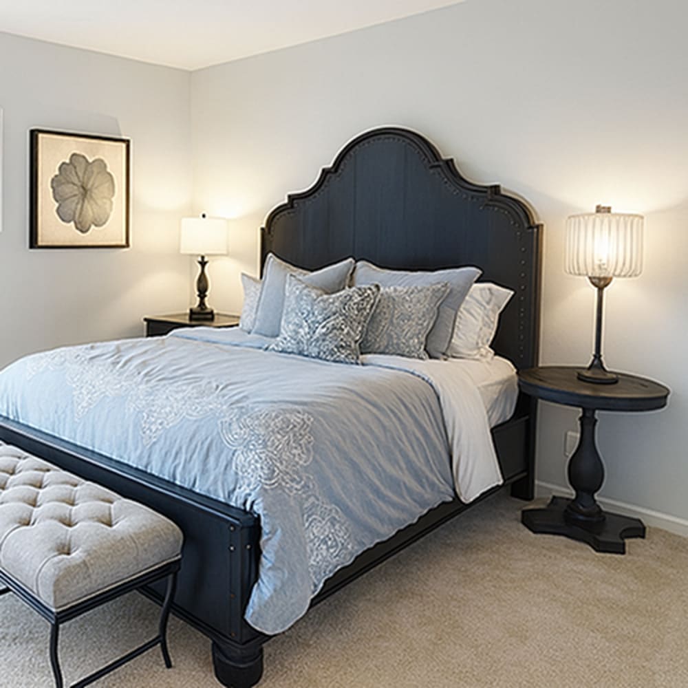 Cozy bedroom with stylish decor at 83 West Townhomes in West Bloomfield Township, Michigan