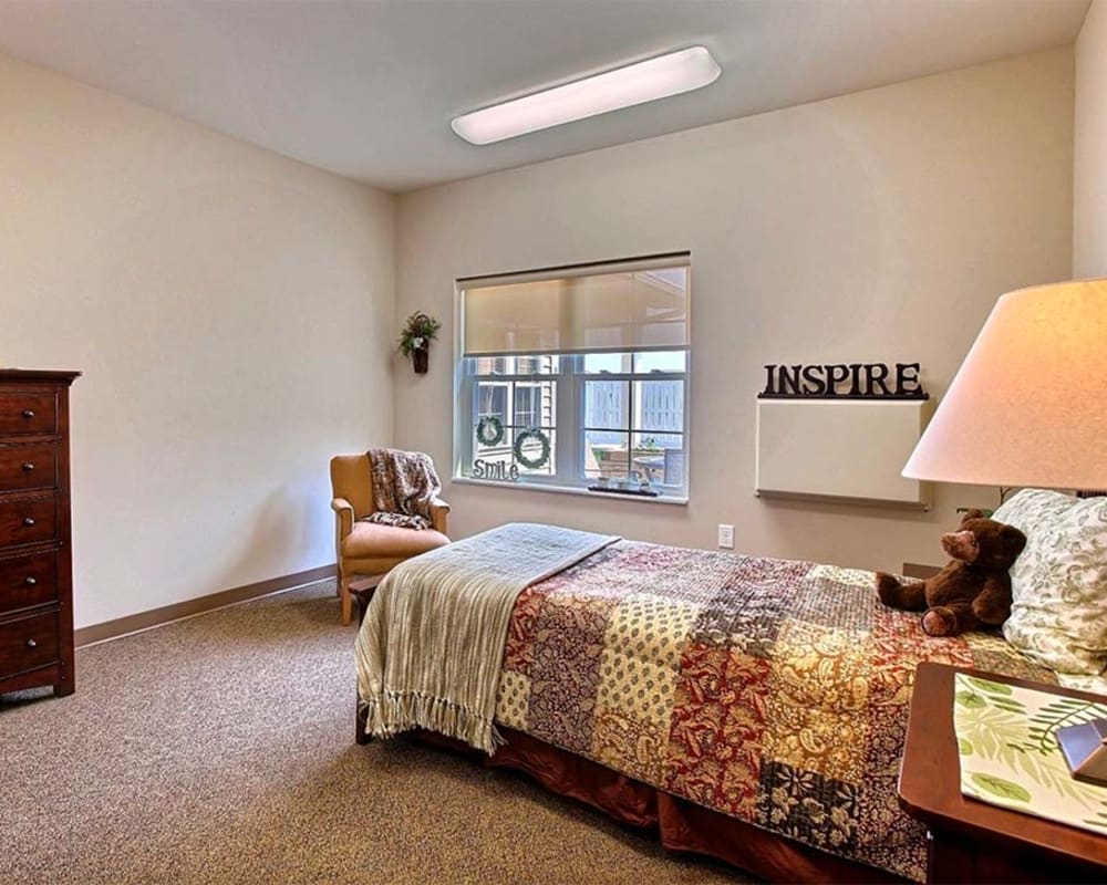 Cozy memory care studio at Milestone Senior Living Hillsboro in Hillsboro, Wisconsin.