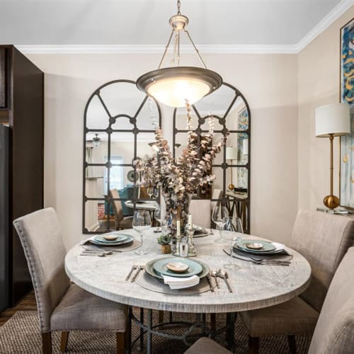 A set dining room table in an apartment at Bowman Station in Macon, Georgia