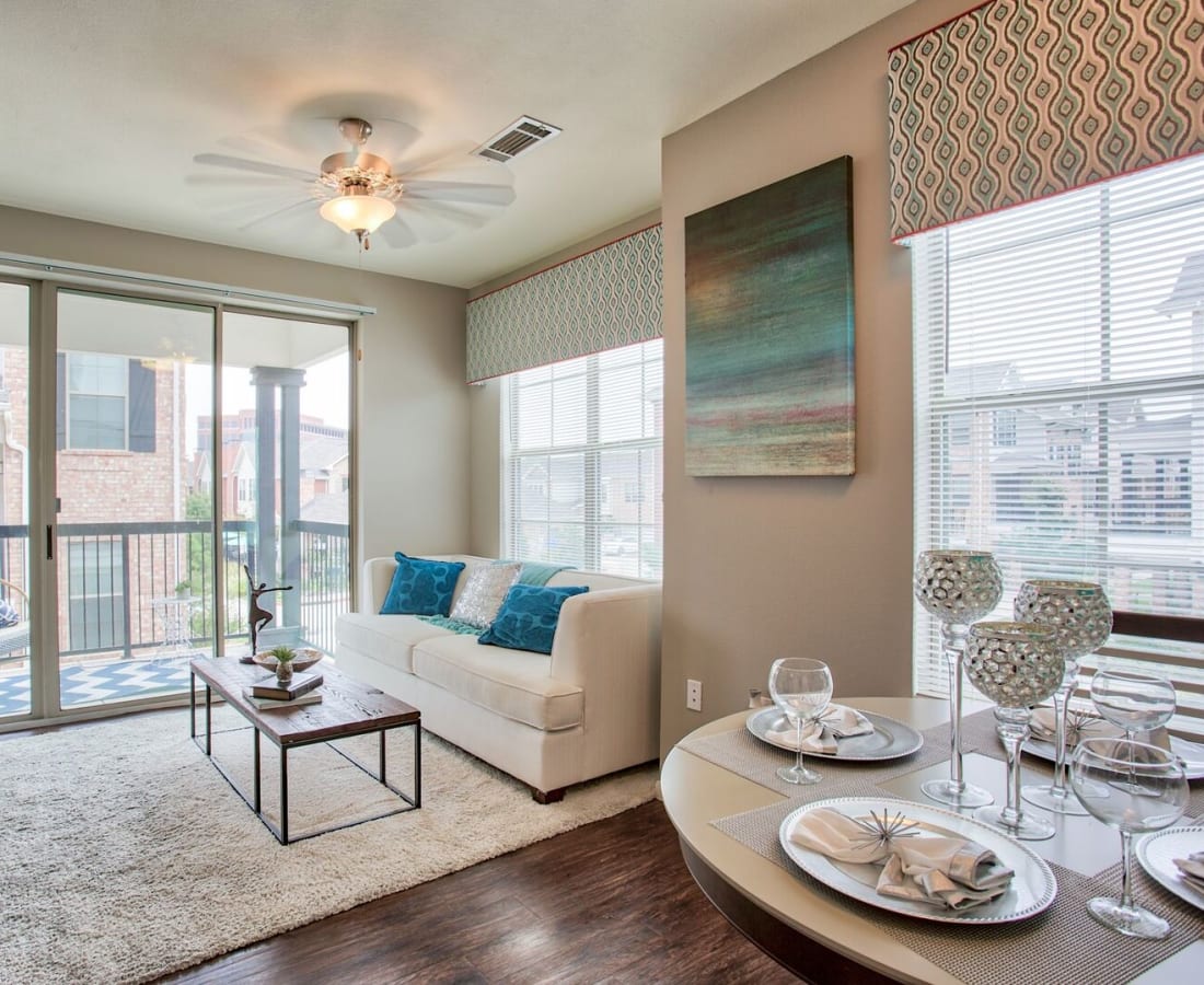 Modern dining area and living room in a luxury model home at Parkside Towns in Richardson, Texas