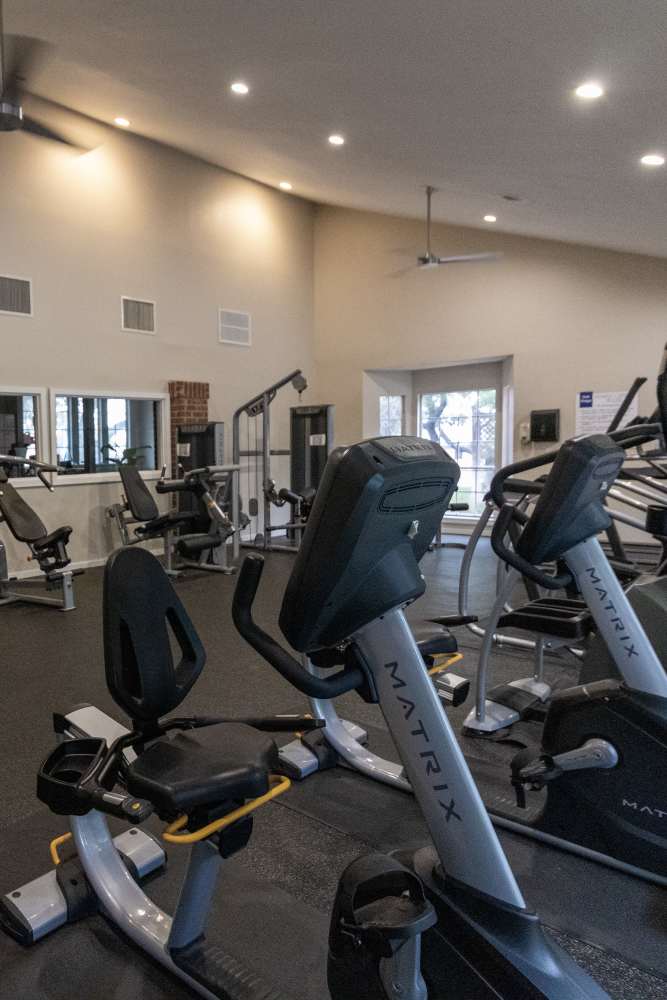 Fitness center with variety of equipment's at Oak Ridge Apartments in San Antonio, Texas