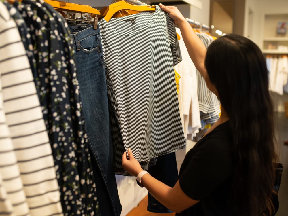 Resident doing some retail shopping near The Reserve at Gilbert Towne Centre in Gilbert, Arizona