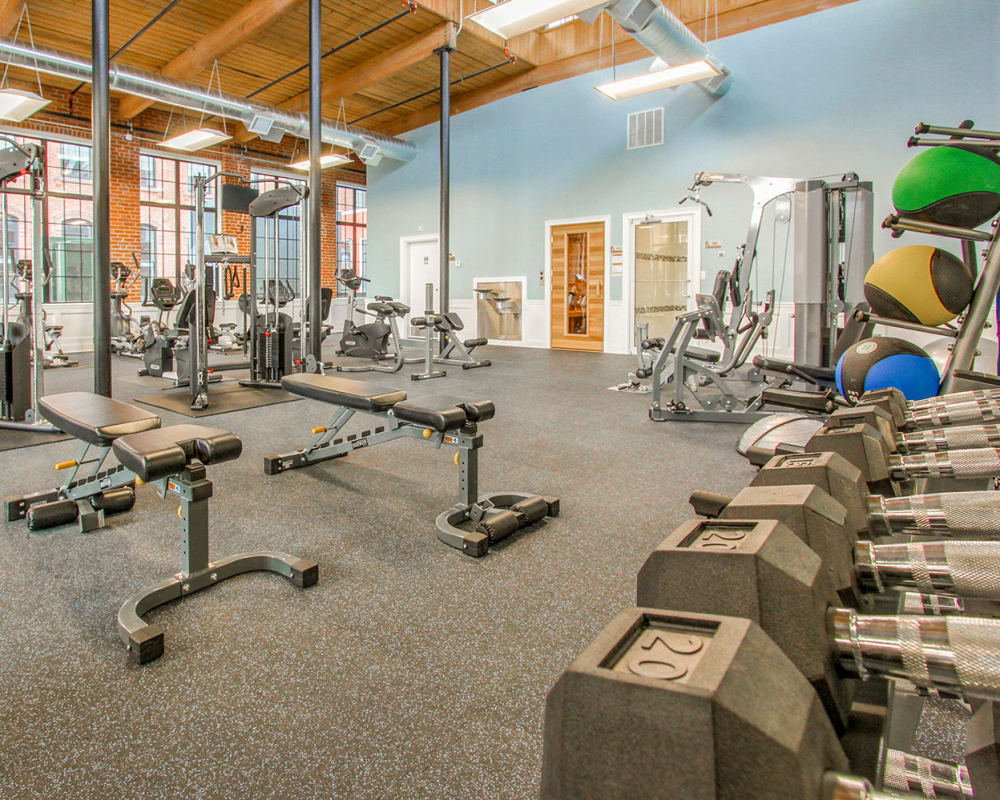 Fully equipped fitness center at The Lofts at Ponemah Mills in Taftville, Connecticut