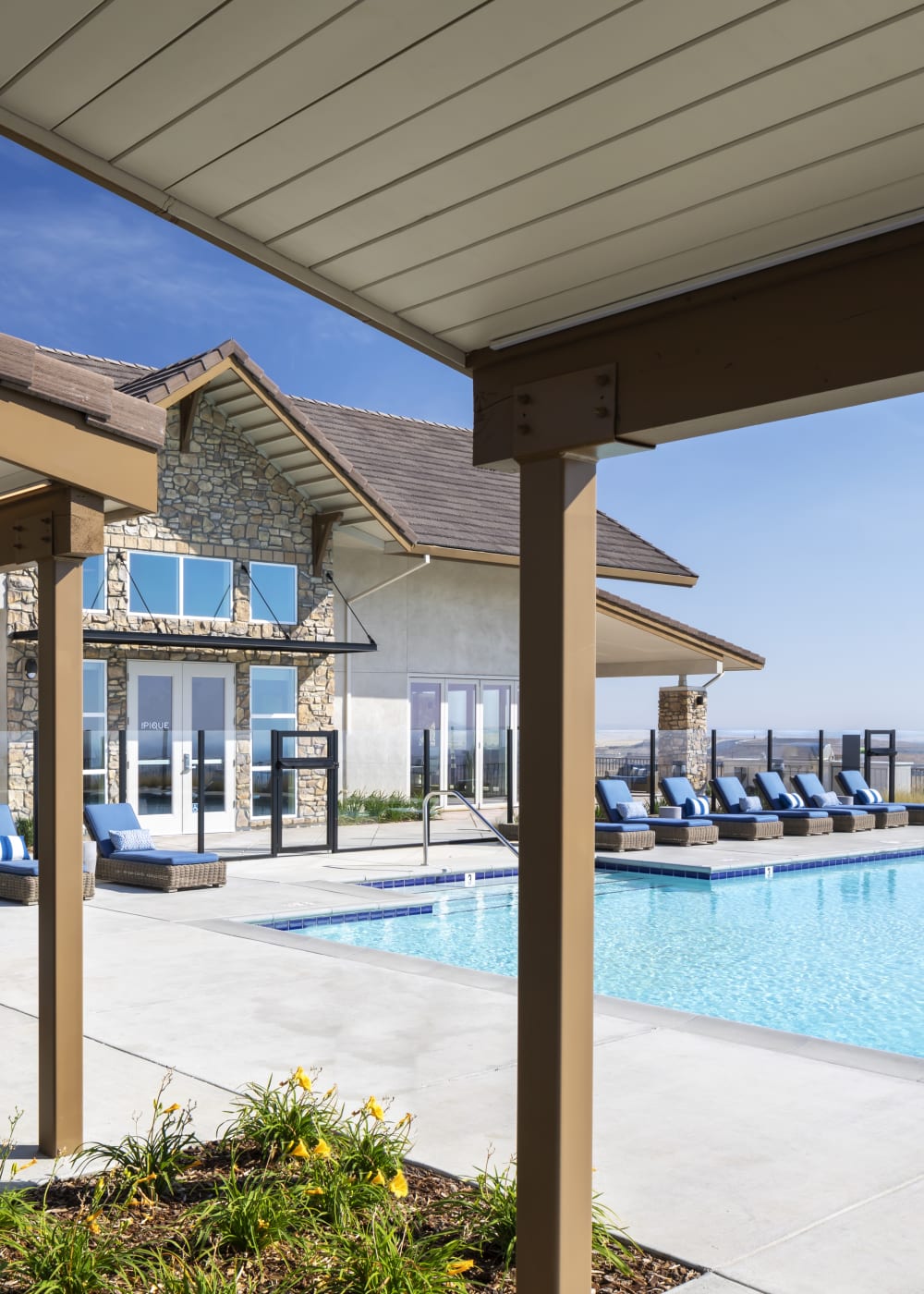 Swimming pool with cabanas at The Pique in Folsom, California