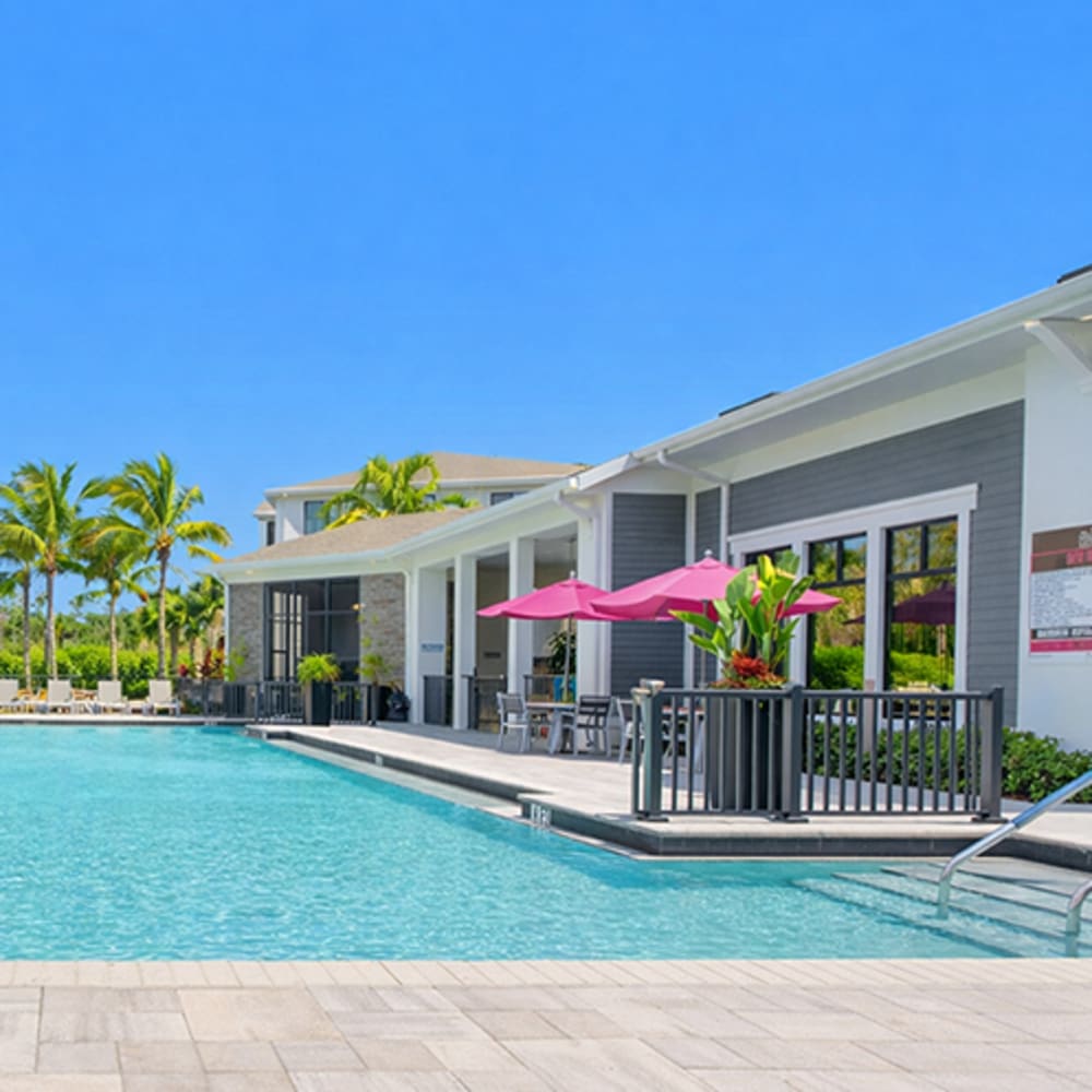 Resort-style pool at Modern apartment community at 81 West Apartments in Fort Myers, Florida