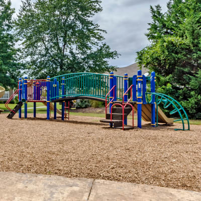 Playground equipment surrounded by trees at Bellevue in Washington, District of Columbia