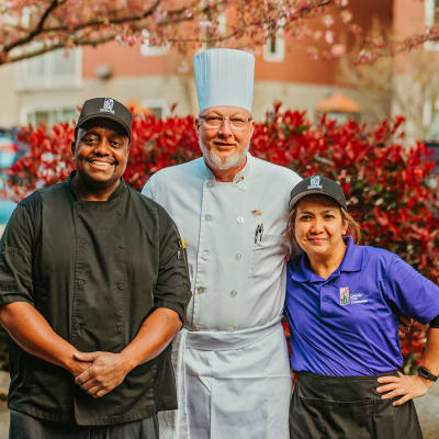 Chef and his crew posing for a photo at Cascade Park Vista Assisted Living in Tacoma, Washington