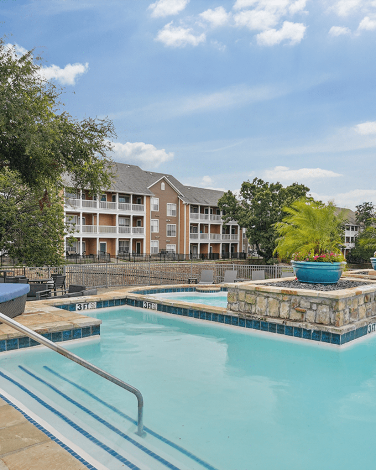 The swimming pool at Andover Park at Flatiron District at Austin Ranch in The Colony, Texas