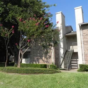 Entrance and stairway at Highlands of Duncanville in Duncanville, Texas
