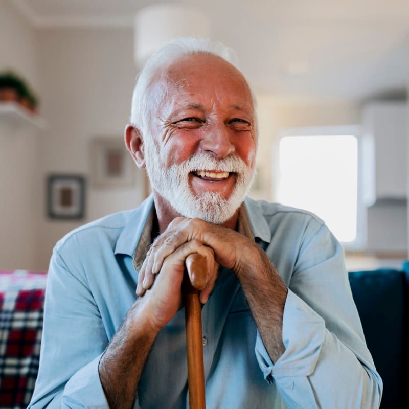 A happy resident smiles Acclaim at Cary Pointe, Cary, North Carolina