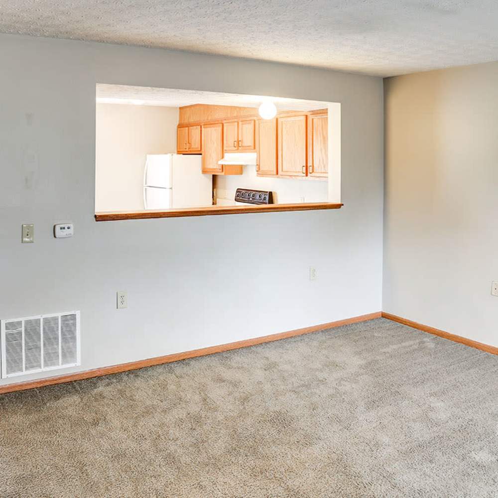 Living room with carpet flooring at Fox Run Crossing in Piketon, Ohio