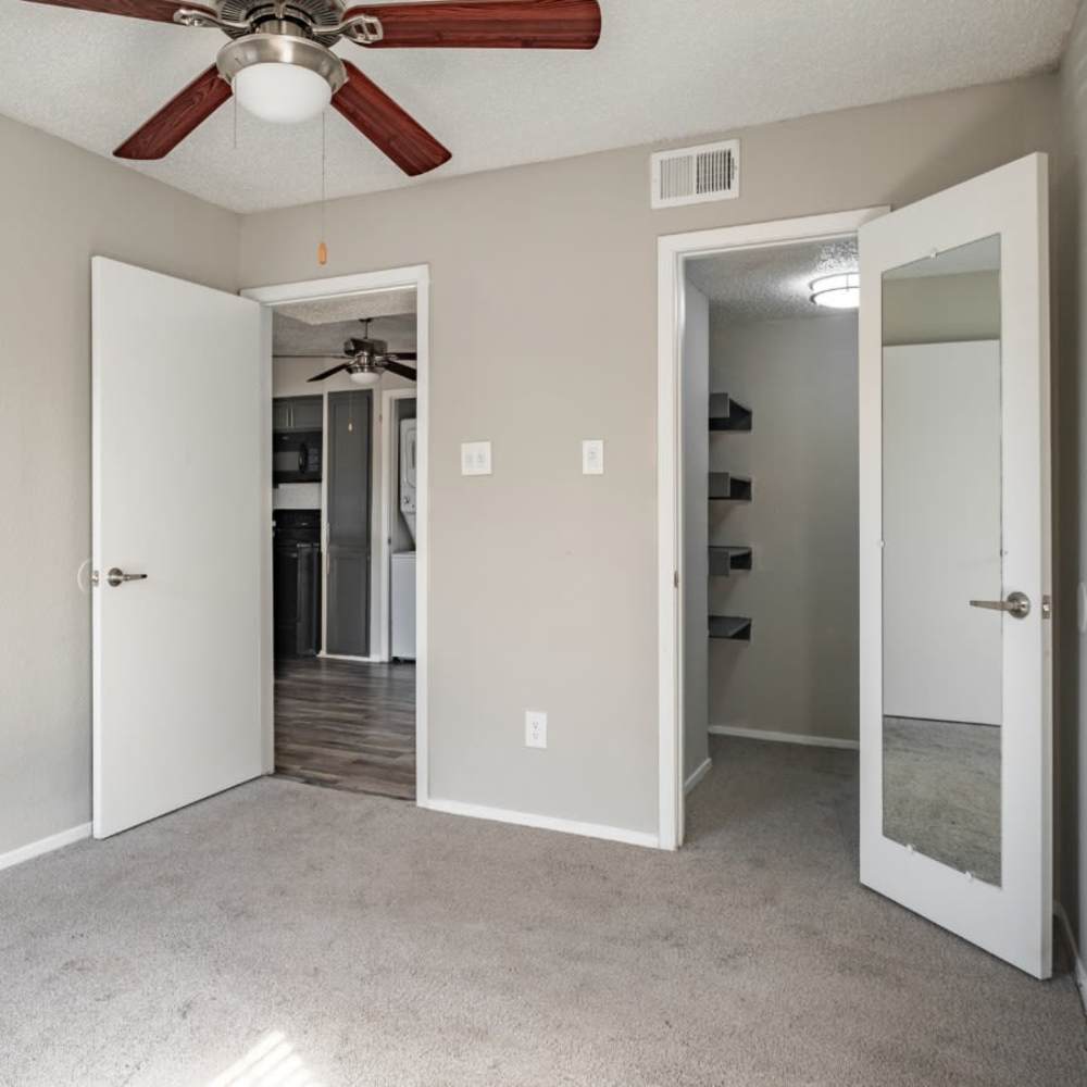 Bedroom with connecting rooms at http://g5-assets-cld-res.cloudinary.com/image/upload/v1763061303/g5/g5-c-5w3qkhnot-devonshire-real-estate-asset-management/g5-cl-1qh6zo3r0a-devonshire-real-estate-asset-management-dallas-tx/uploads/Bedroom_lsxkyk.jpg