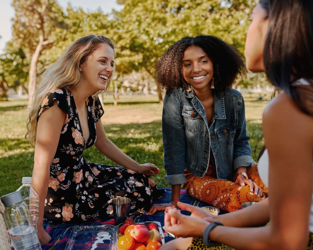 Women out enjoying a picnic near Southern Cove Apartments in Temple Terrace, Florida