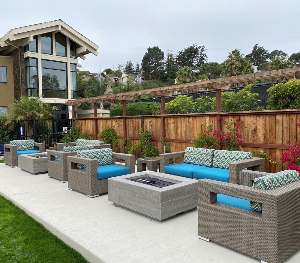 Outdoor lounge area near the pool at Harbor Point Apartments in Mill Valley, California