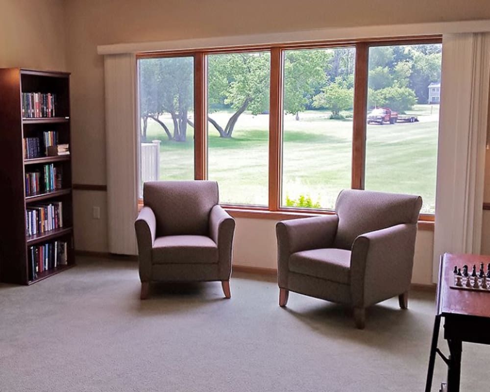 Resident reading room with chess board at Arbor View in Burlington, Wisconsin.