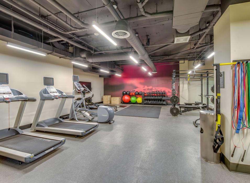 Treadmills and free weights in the fitness center at Verse Seattle in Seattle, Washington