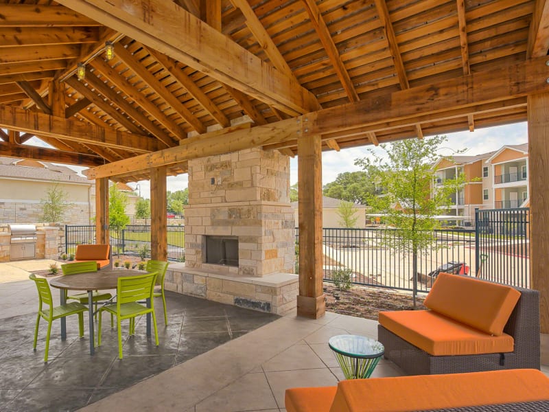 Outdoor community fireplace for residents at Creekside at Kenney's Fort in Round Rock, Texas