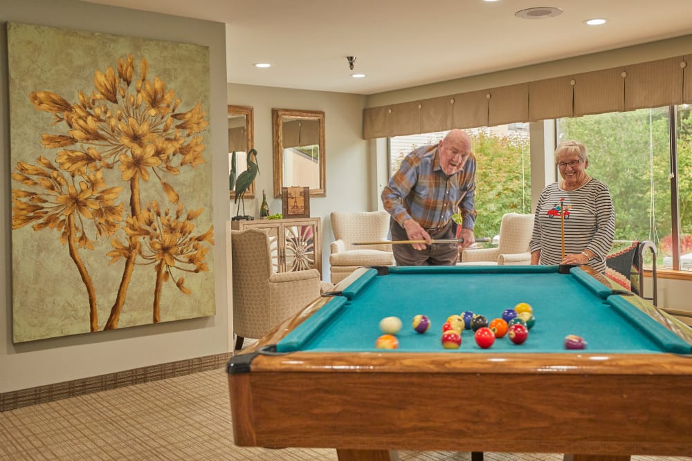 Residents playing pool at Shorewood Senior Living in Florence, Oregon