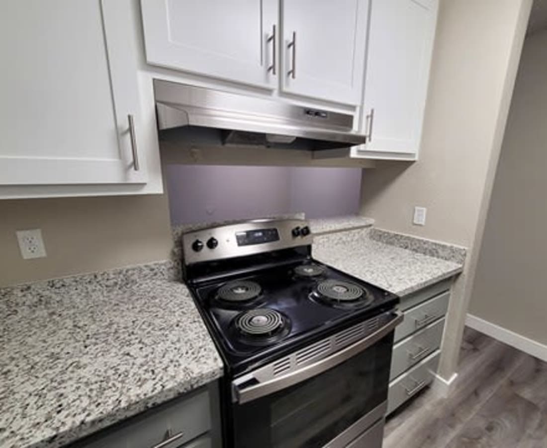 Kitchen  with electric range at  The Mews At Dixon Farms in Dixon, California