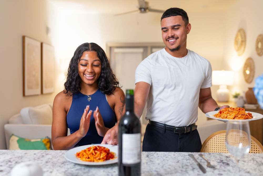Couple in their home at The Flats at Crosspointe in Columbia, South Carolina
