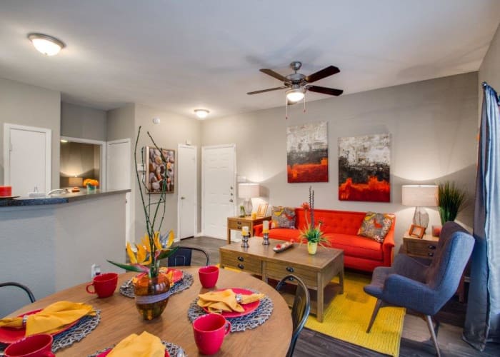 Model living room and dining room at Watermarke Apartments in Fort Worth, Texas