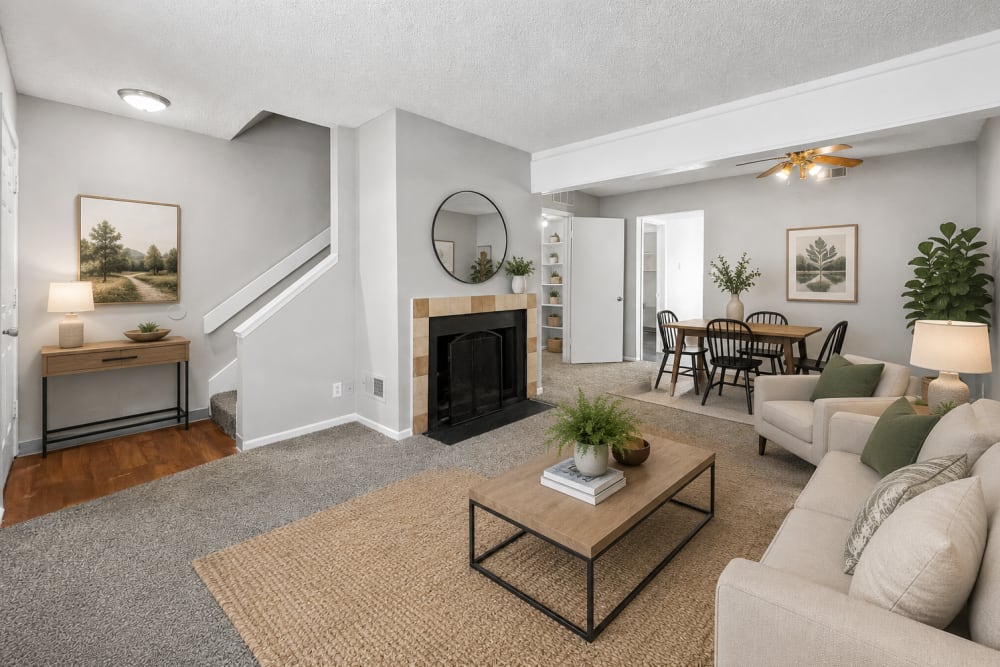 Living room of townhome with in-home fireplace at Union Flats & Townhomes in Lawrence, Kansas