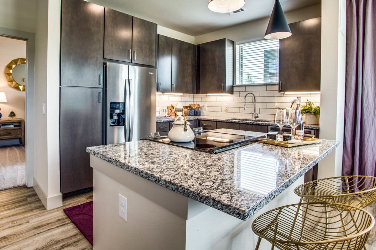 Stainless-steel appliances in a kitchen at Waters Edge at Mansfield in Grand Prairie, Texas