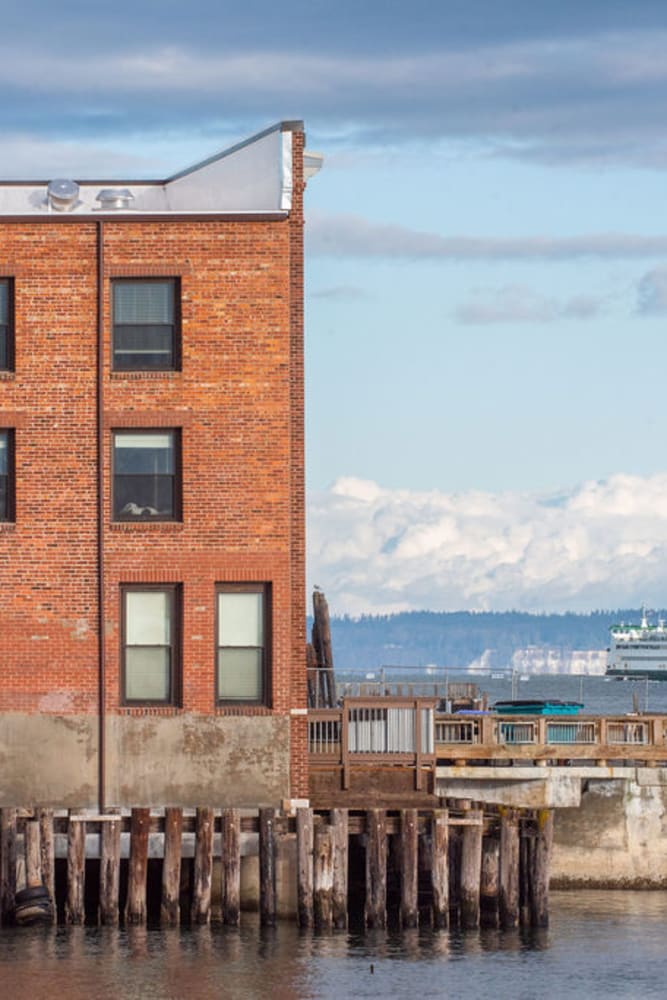 Exterior of the building by the water at Admiralty Apartments in Port Townsend, Washington
