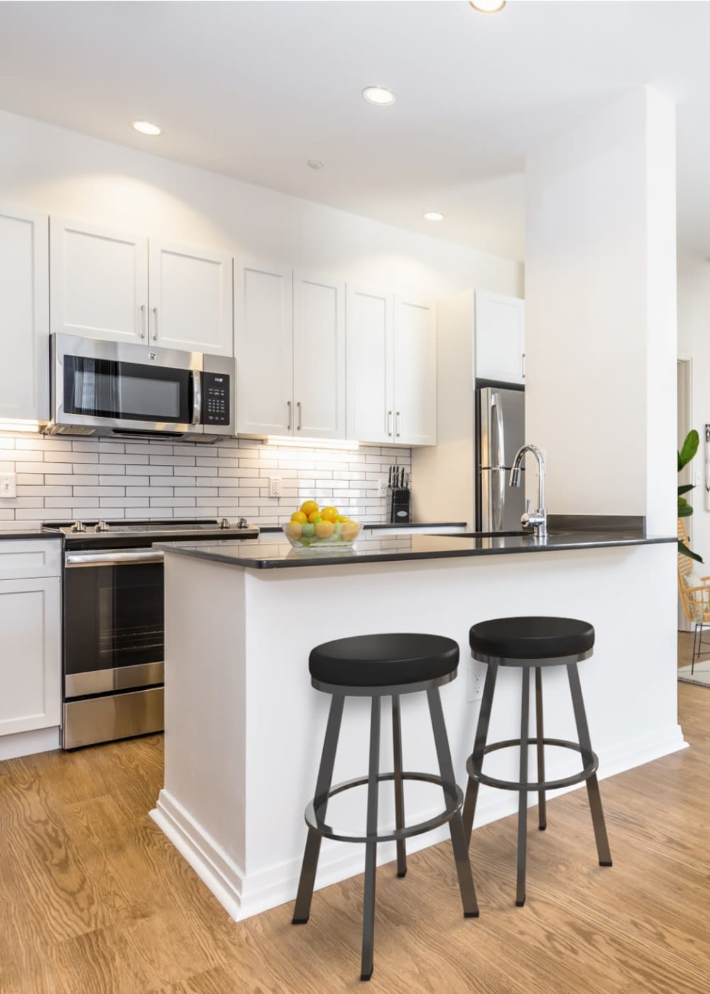 Kitchen apartment rendering with counter seating at One India Street Apartments in Boston, Massachusetts