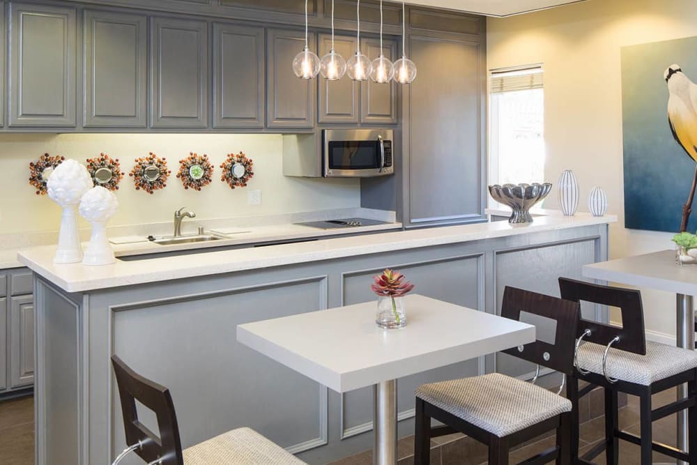 Gathering kitchen with plenty of seating at Alicante Apartment Homes in Aliso Viejo, California