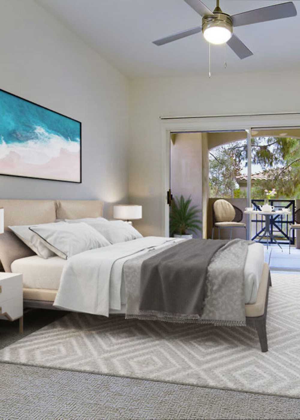 Modern bedroom with ceiling fan at San Marino in Tempe, Arizona
