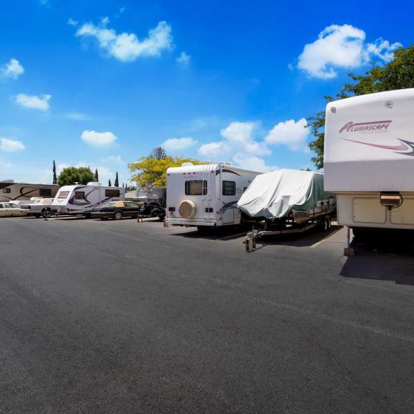 Boats and RVs at StorQuest RV & Boat Storage in Apopka, Florida at dusk