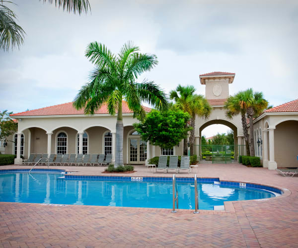 Beautiful blue outdoor pool at Green Cay Village in Boynton Beach, Florida