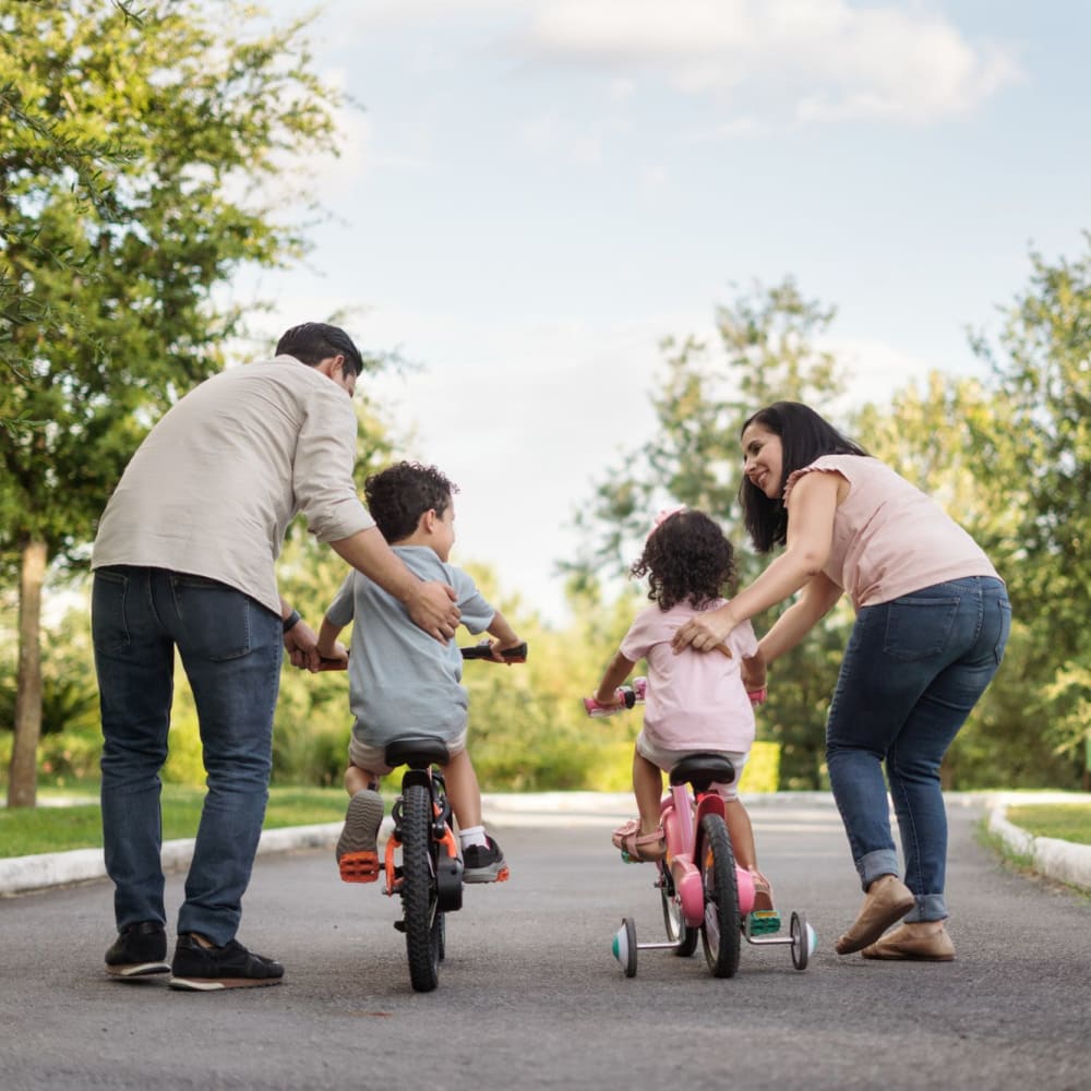 Residents with their kids neat at Bellerose at Bees Ferry in Charleston, South Carolina