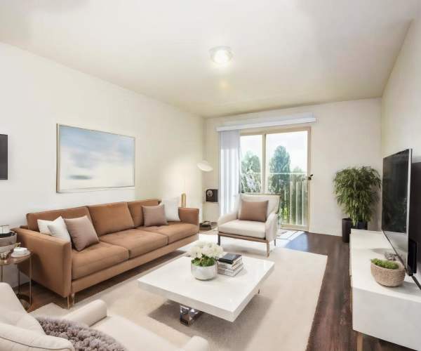 Living room in a model apartment at Blanton Commons in Beaverton, Oregon