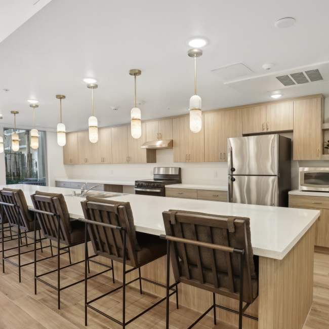 Clubhouse Kitchen with wooden cabinets at Tempo in Las Vegas, Nevada