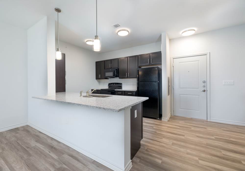 Kitchen with granite countertop at Emerald Place in Lancaster, Ohio