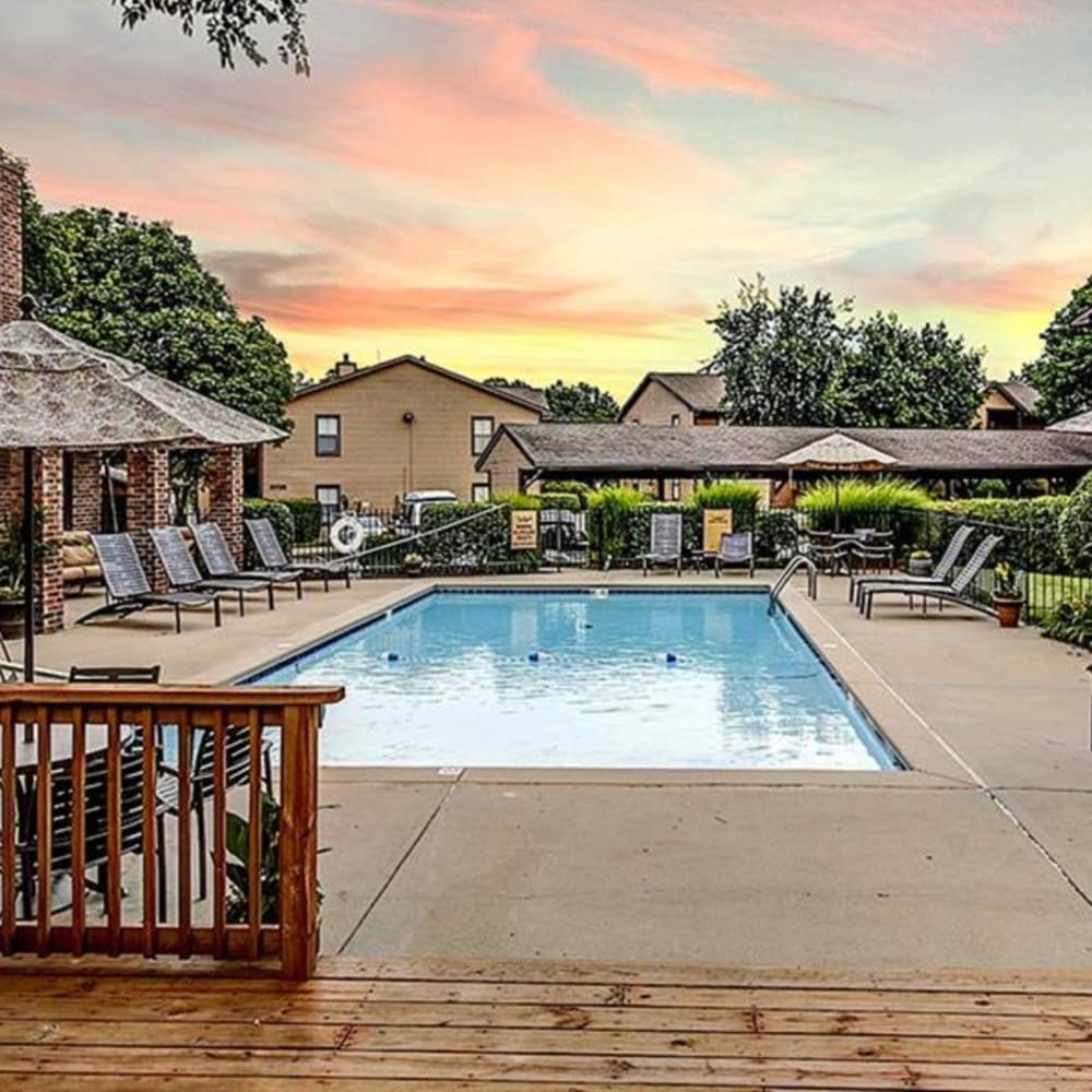 Enjoy a sunset from the pool at Springhill Apartments in Overland Park, Kansas