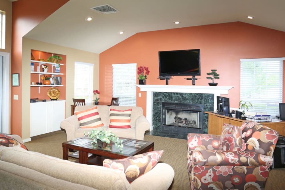 Clubhouse with TV at Bennington Hills Apartments in West Henrietta, New York