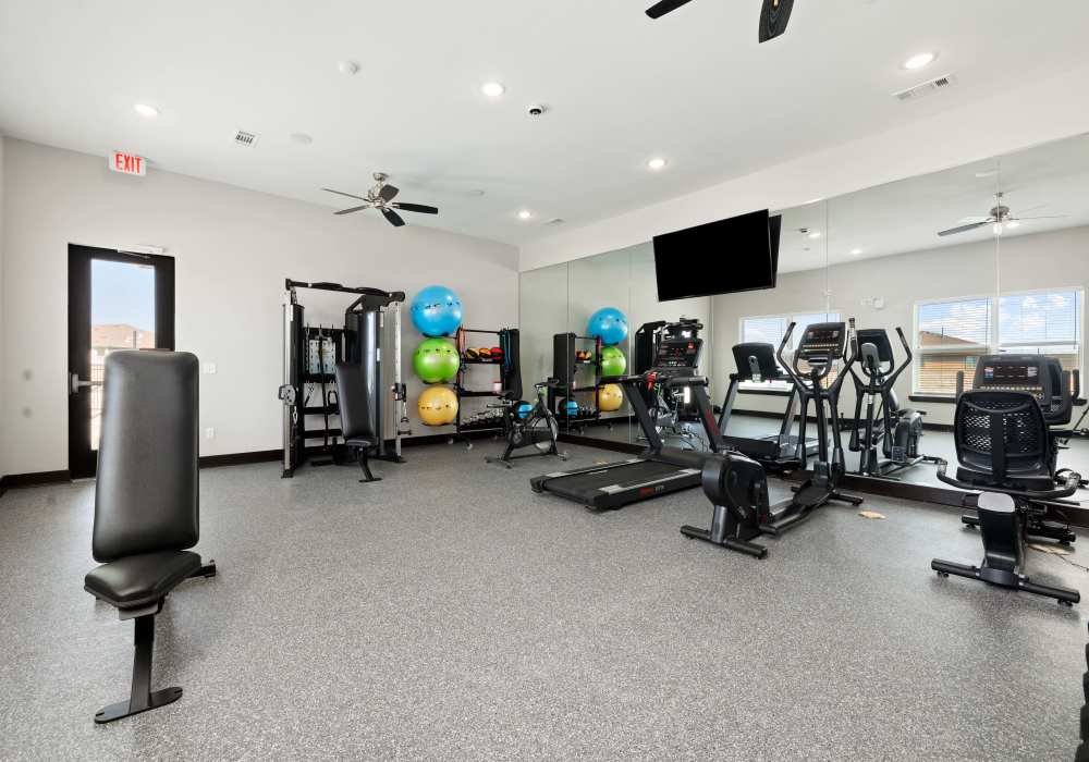 Community fitness center at The Janson in Del Valle, Texas