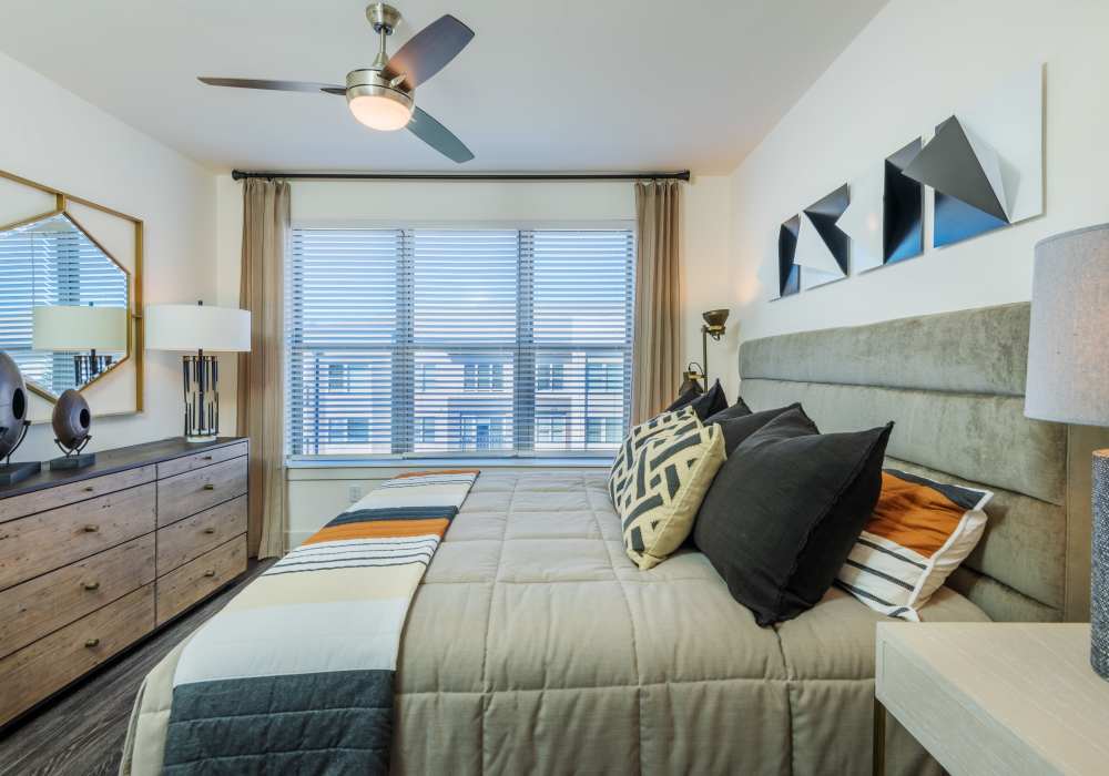 Furnished bedroom at The Reverie at Lake Boone in Raleigh, North Carolina
