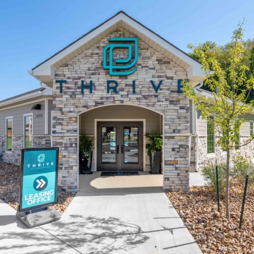 Outside the leasing office at Thrive at Creekside in Parkville, Missouri